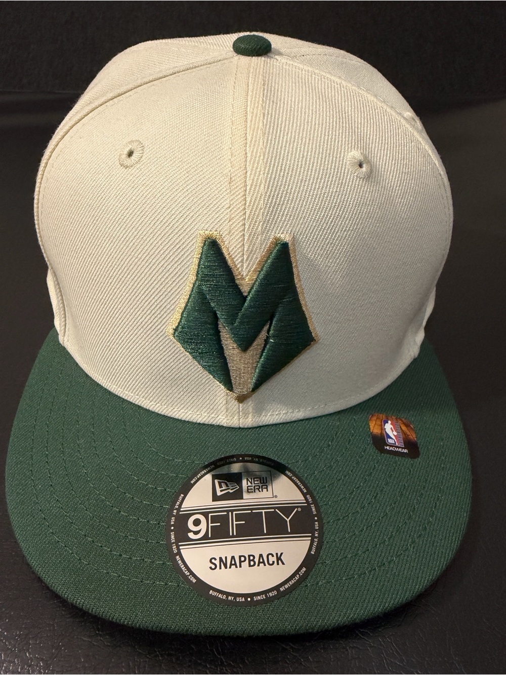 Milwaukee Bucks New Era Men’s 9FIFTY Snapback Cap in Cream and Forest Green
